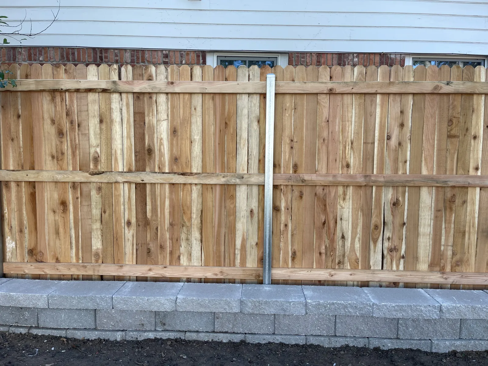 New wood privacy fence installed in a Tulsa backyard