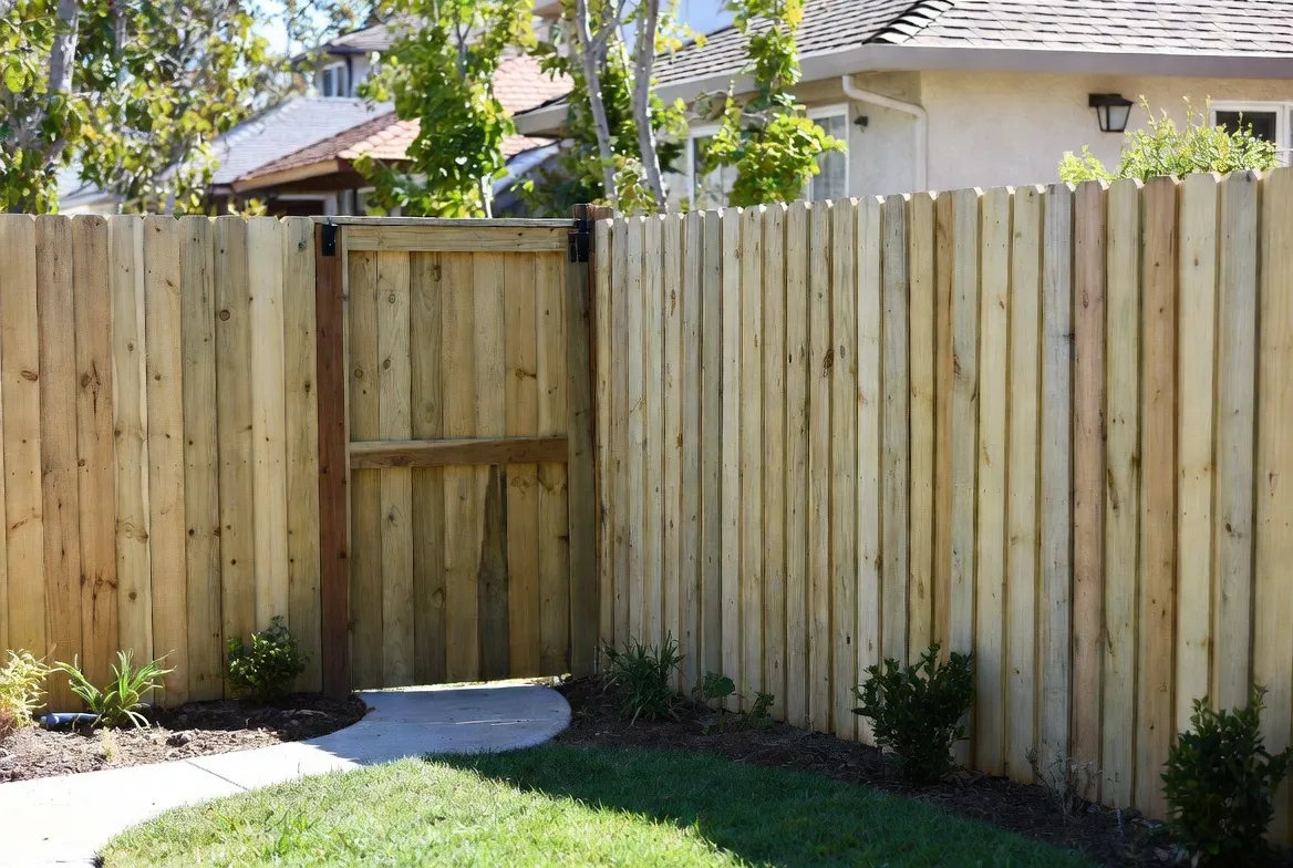 New wood privacy fence and gate installed at a Tulsa-area home