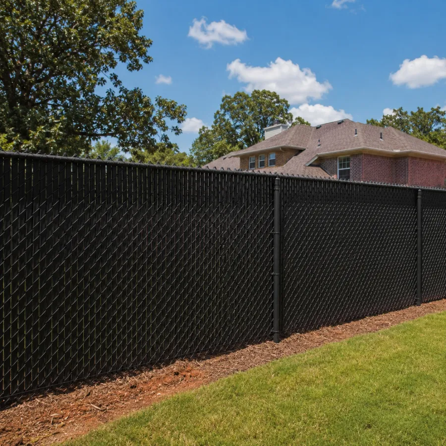 Chain link fence fitted with privacy slats for a screened backyard in Tulsa, OK